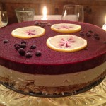 Raw Vanilla Cheezecake with Orange Berry Sauce